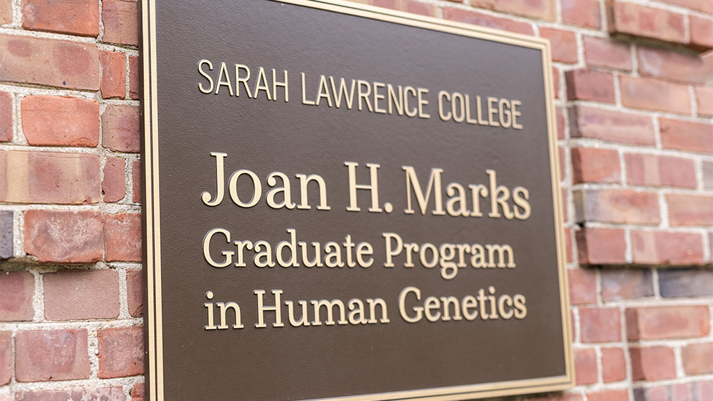 Picture of Joan H. Marks Graduate Program plaque on wall