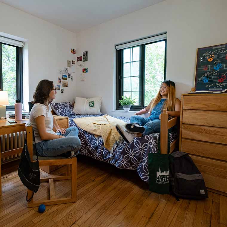 students hanging out in dorm room